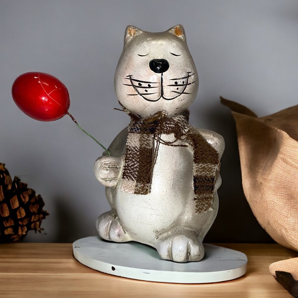 Ceramic Cat Figurine with Red Balloon and Scarf